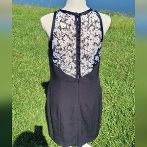 Black sleeveless dress by Donna Ricco